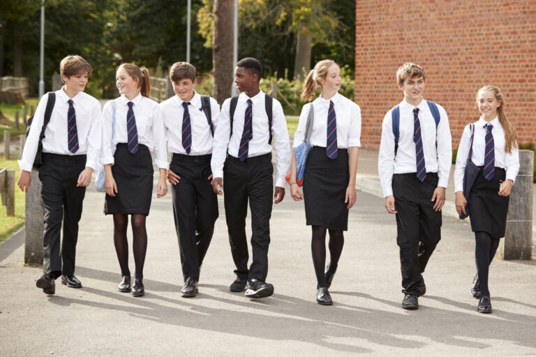 Students walking in school uniforms